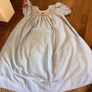Blue Smocked Dress with Red flag Accents by zucchini kids